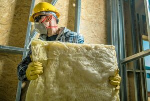 Worker with Wool Insulation